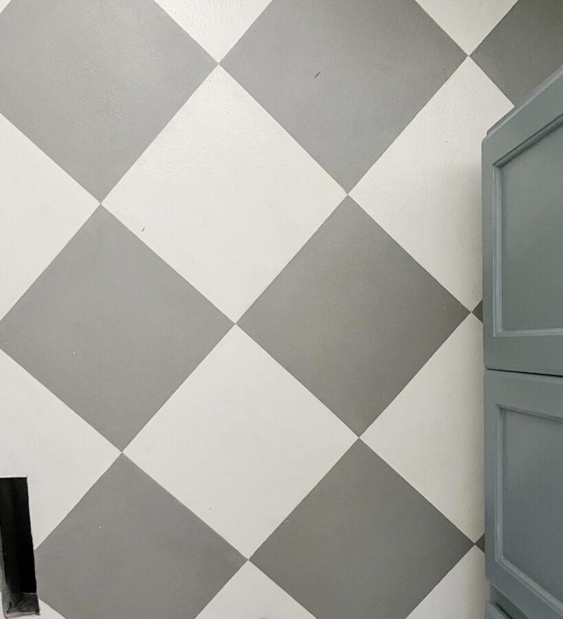 Painted gray and white checkered bathroom floor